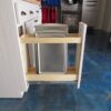 base cabinet pull out spice rack or cookie sheet organizer